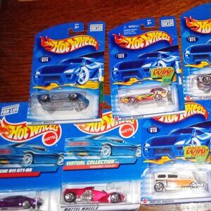 Collection of Vintage Hot Wheel Vehicles, New in Original Packages